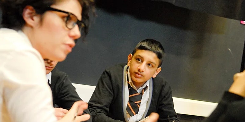 young people looking engaged talking about the climate