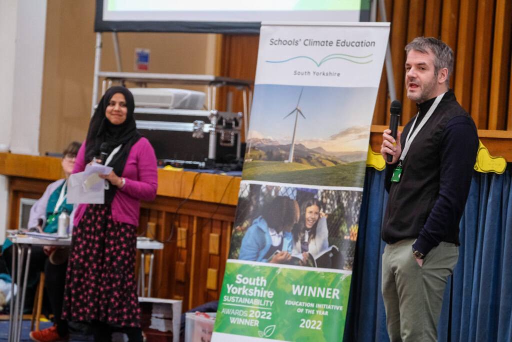 SCESY teacher Rafia Hussain reads out tricky questions from pupils to South Yorkshire Mayor Oliver Coppard.