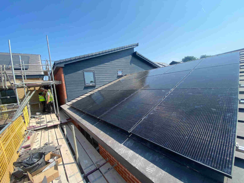Solar panels being installed on a co-housing project in Sheffield, by Sheffield Renewables